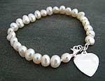 Pearl bracelet with silver heart charm